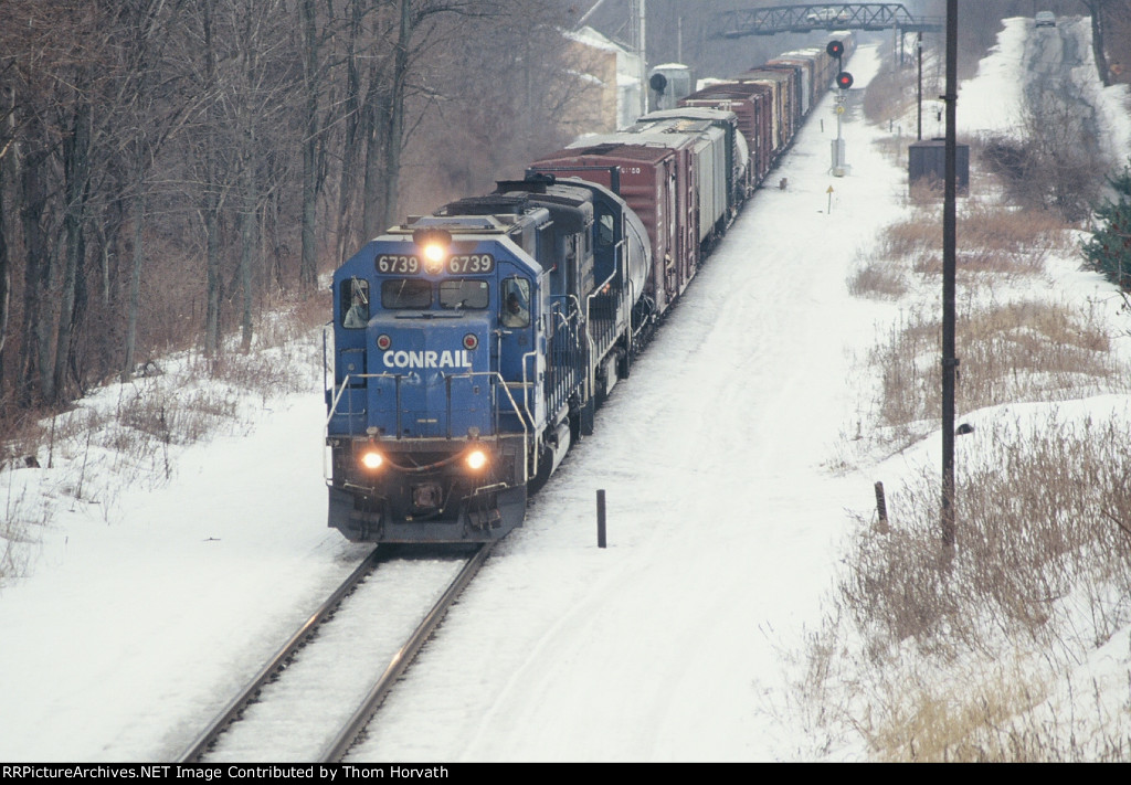 CR 6739 leads OIPI west past LEHL MP 68.8 on this snowy day